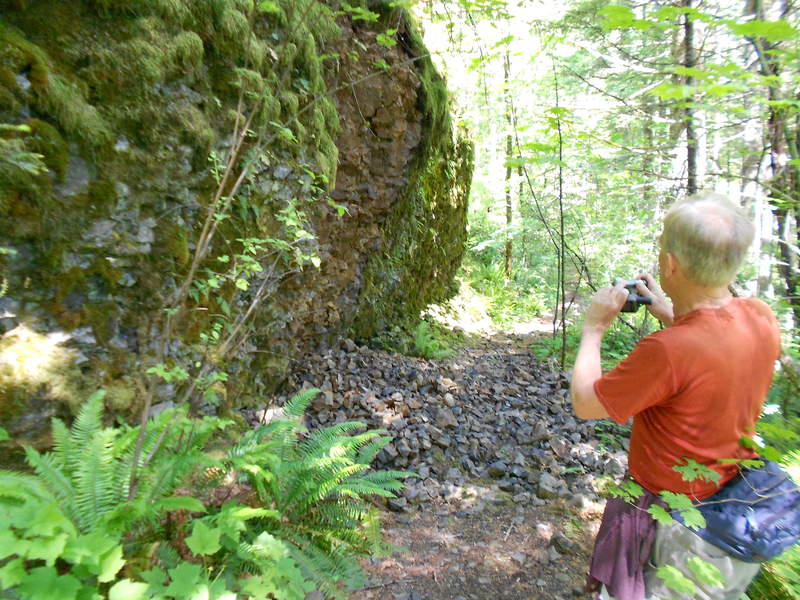 Don taking a pic of huge boulder on Two Chiefs Trail