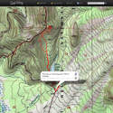I did the best to find my summit in Google Earth. There is a ridge and my summit is the lower of the 3.