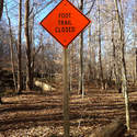 Back East, we have construction crews put in our trail signs.