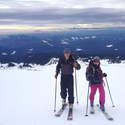 friends skiing uphill