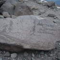 Rock with an inscription from a Japanese climbing party in 1910